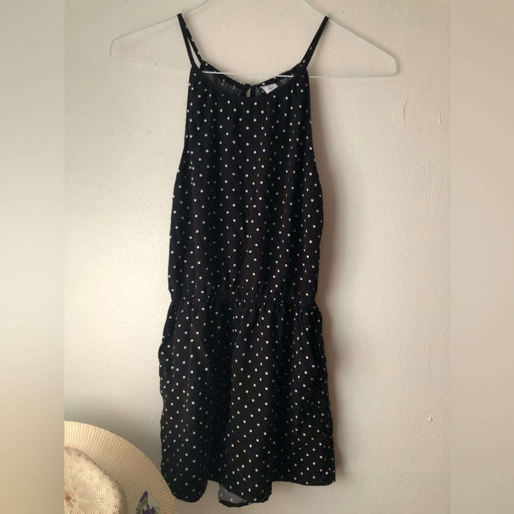 Black romper with white polka dots